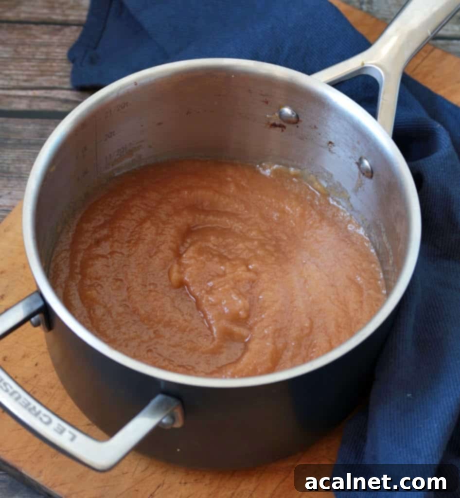 Blended applesauce in the pot, showing a smooth texture.