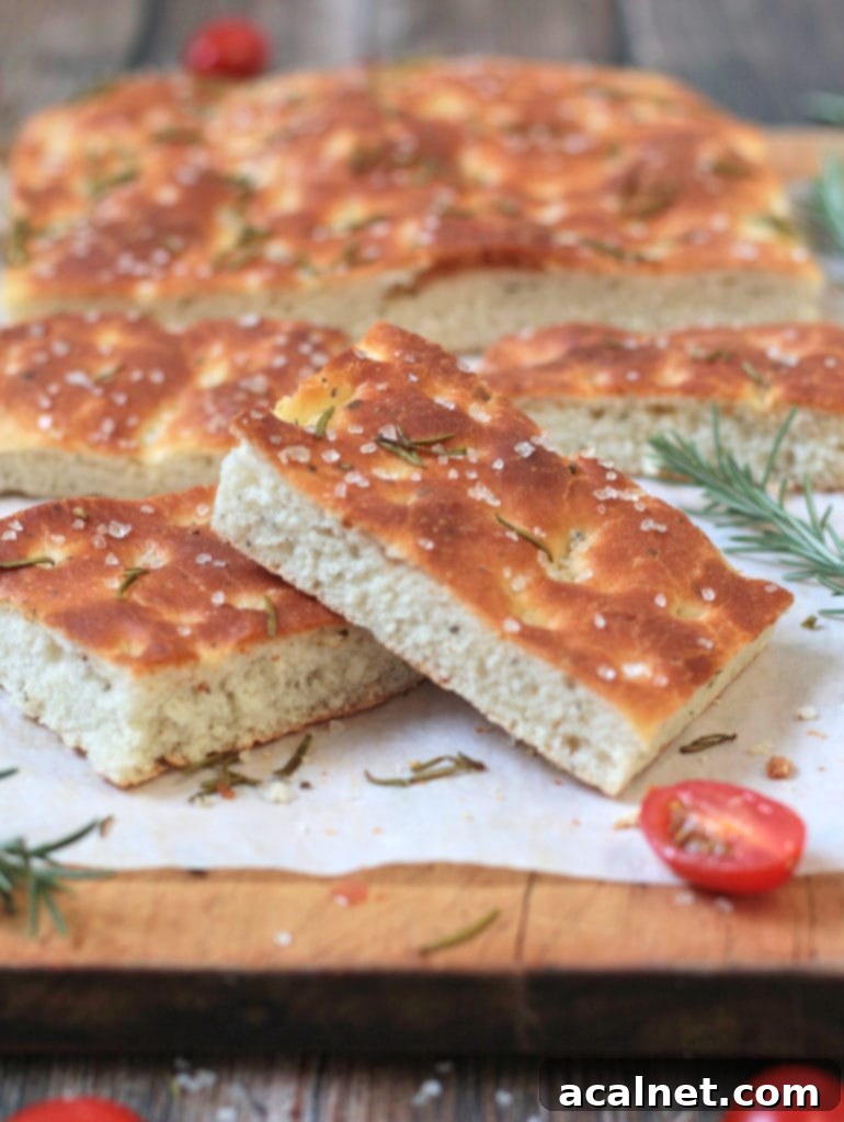 Effortless Rosemary Focaccia Perfection 6 Close-up on the bread.
