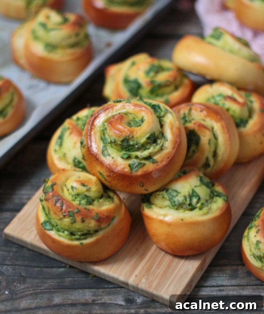Spinach and Ricotta Rolls served beautifully on a wooden serving board