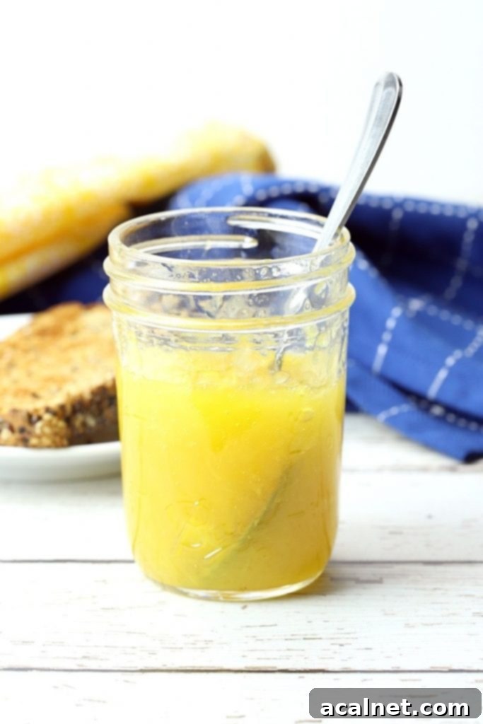 Ultimate Sweet Pancake Topping Guide 16 Homemade pineapple freezer jam in a glass jar.