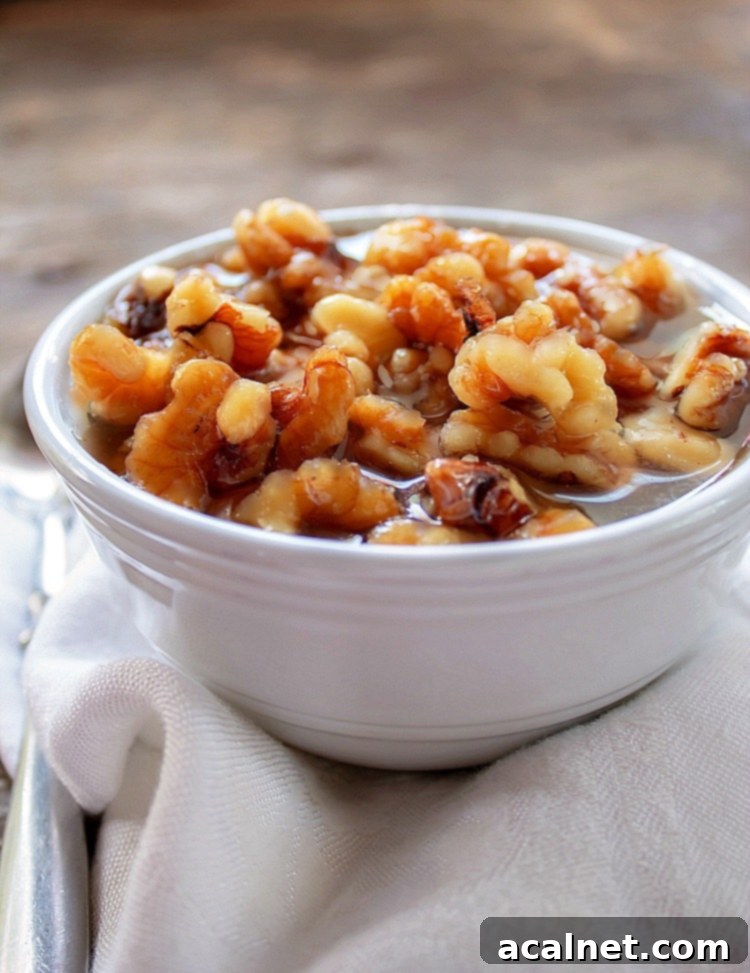 Ultimate Sweet Pancake Topping Guide 29 Wet walnuts topping in a serving bowl, showcasing the syrup-coated nuts.