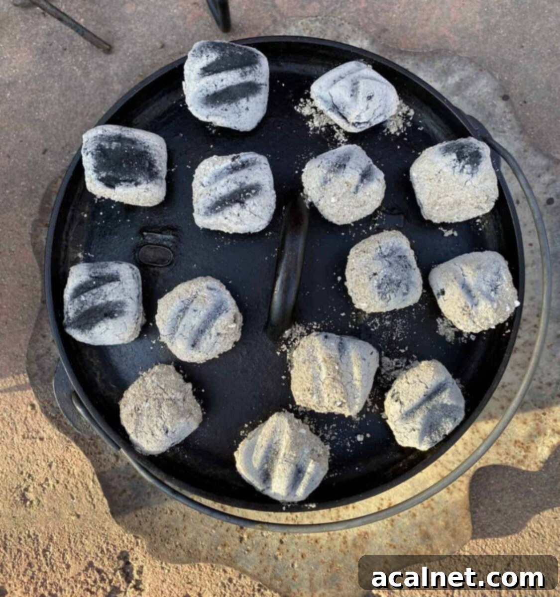 Fourteen coals on top of the Dutch Oven lid.