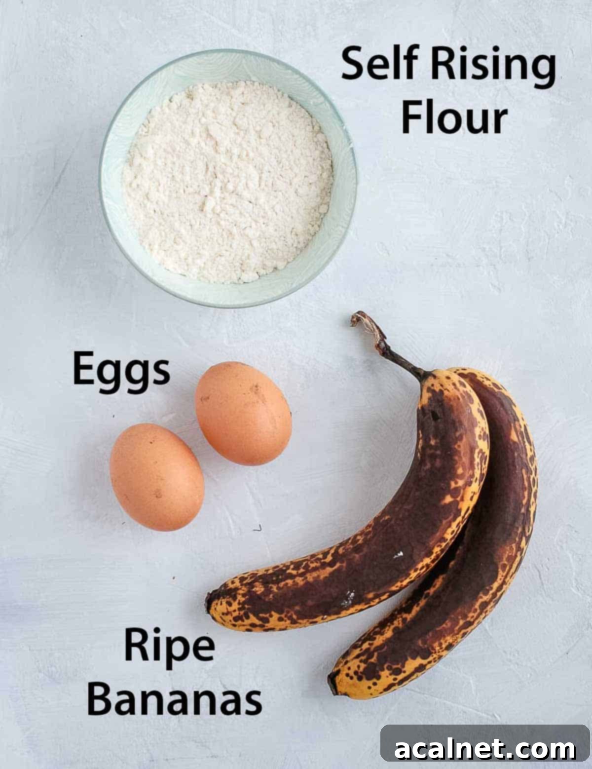 Ingredients placed on a white surface.