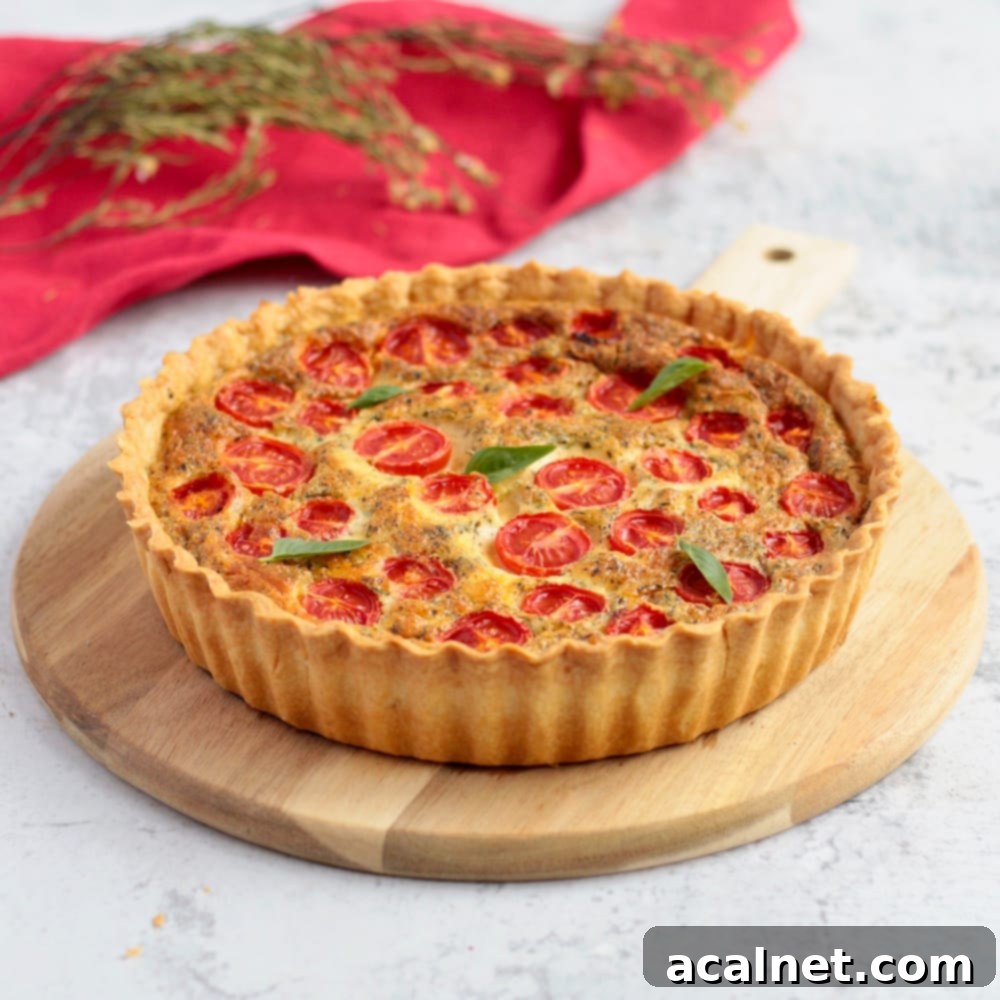 Quiche on a round wooden board