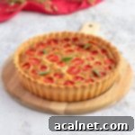 Cheese Quiche with Tomato on a serving board