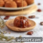 Caramel Sauce poured over a Vegan Sticky date Pudding