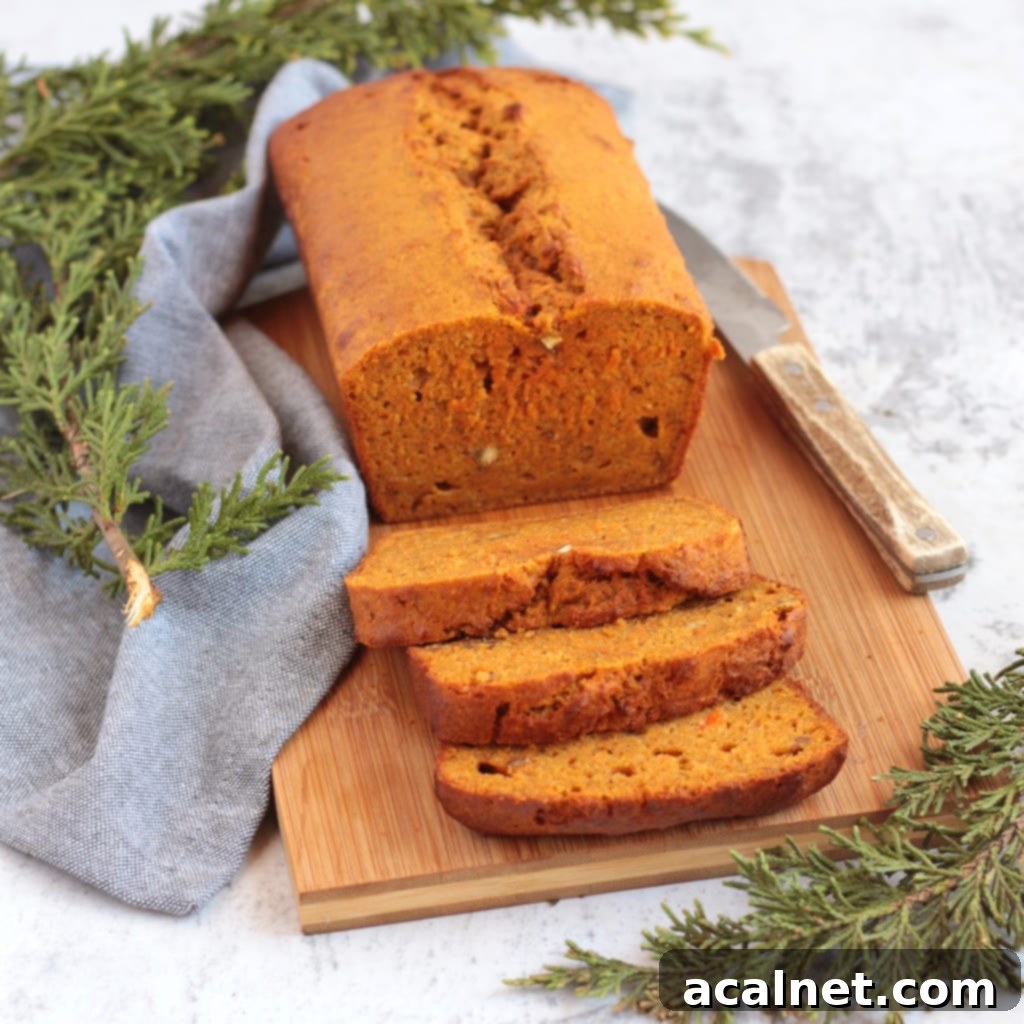 Carrot Loaf Cake on a wooden board