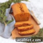 Carrot Loaf Cake on a wooden board