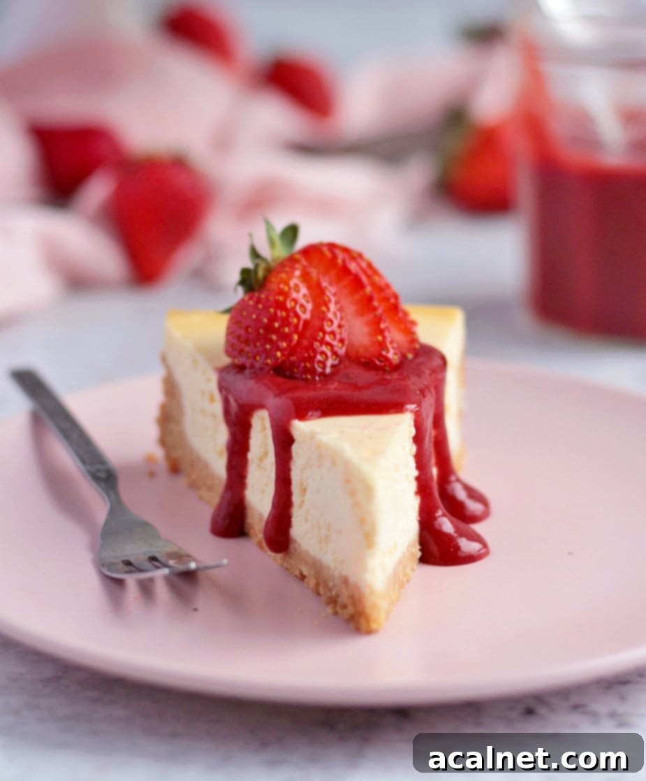 Cheesecake topped with the Strawberry Sauce.