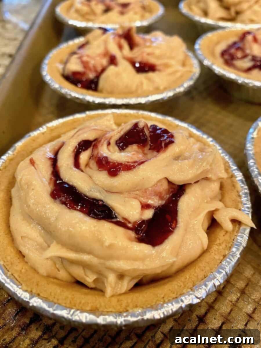 Swirling jam into peanut butter pie filling