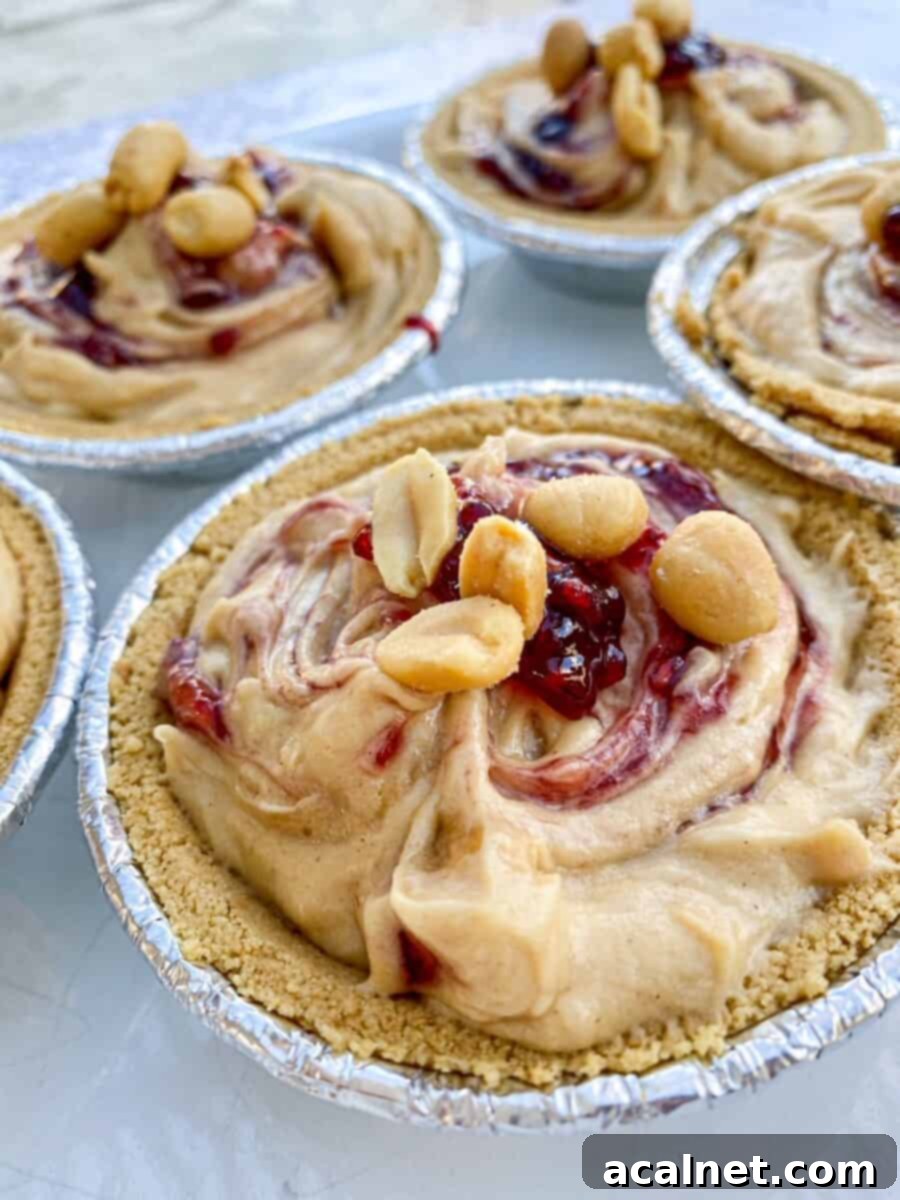 Small peanut butter pies assembled on a counter.