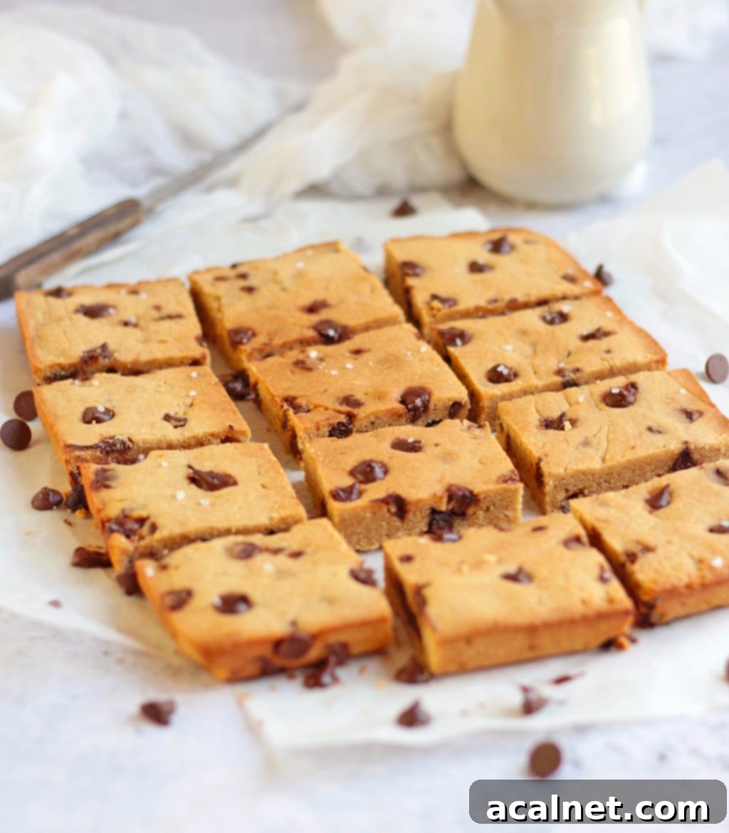 Choc Chip Blondies sliced on baking paper.