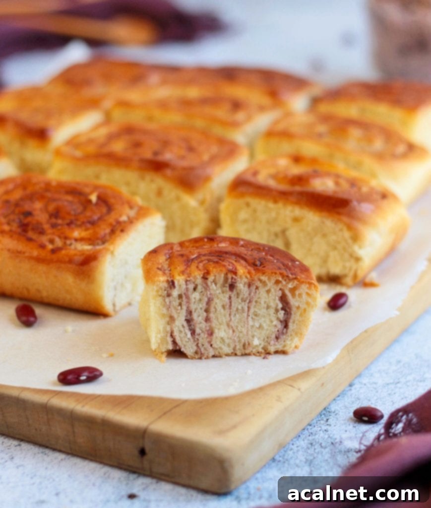 Baked Red Bean Delights 9 Half a roll on a cutting board