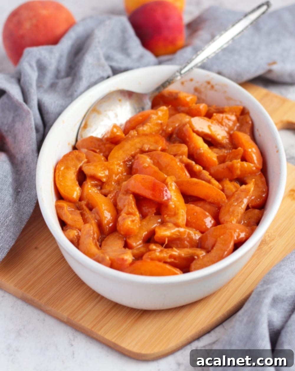 Fresh apricots filling in a white ceramic dish