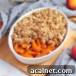 Placing the oat crumble over the fresh apricots