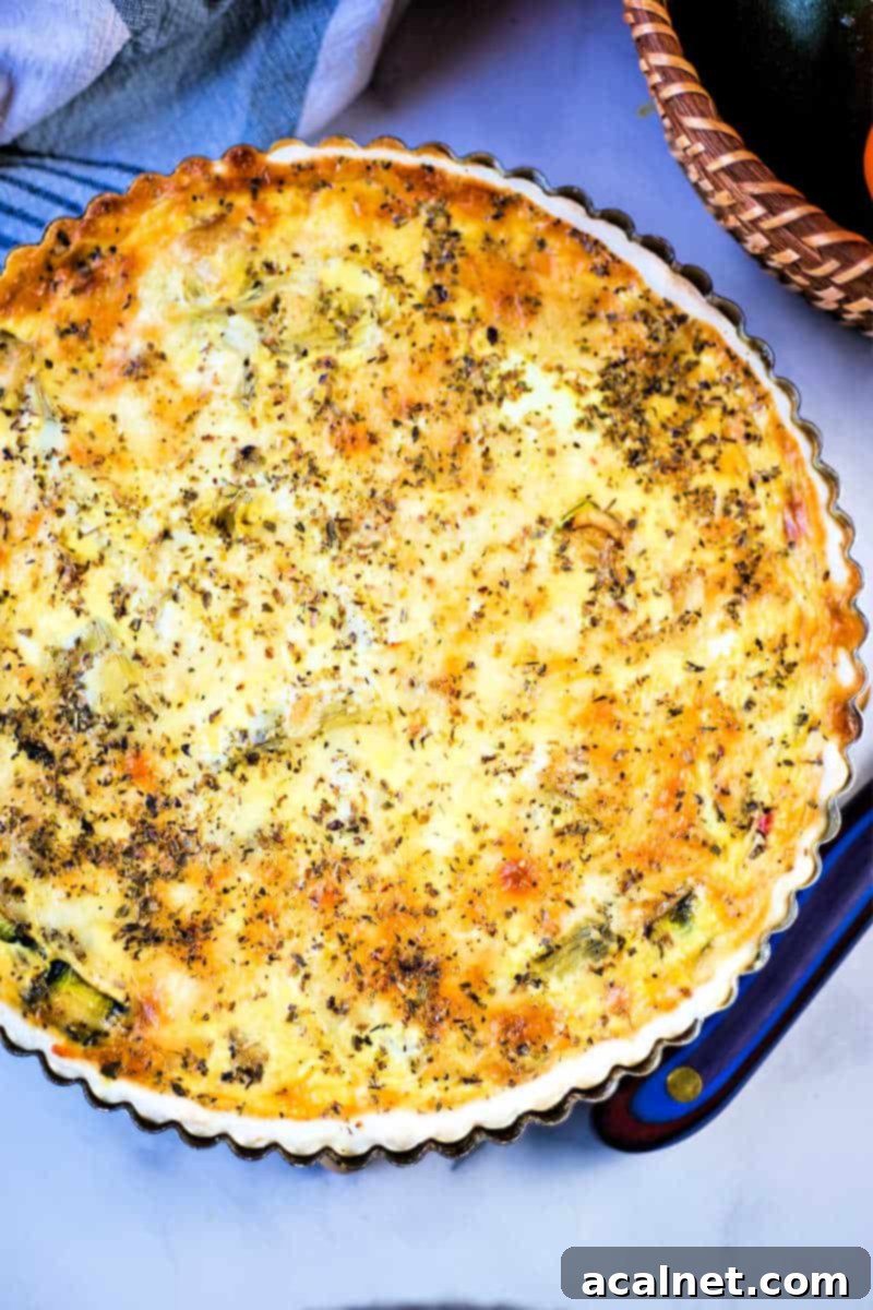California Quiche, a vibrant mix of fresh zucchini, red bell peppers, onion, and artichoke hearts, baked to perfection.