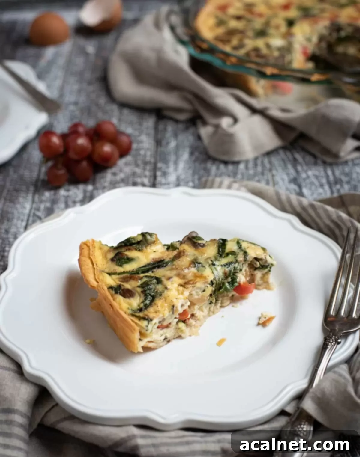Easy Veggie Quiche, lightened up with milk instead of cream and loaded with colorful vegetables, a simple and quick breakfast classic.