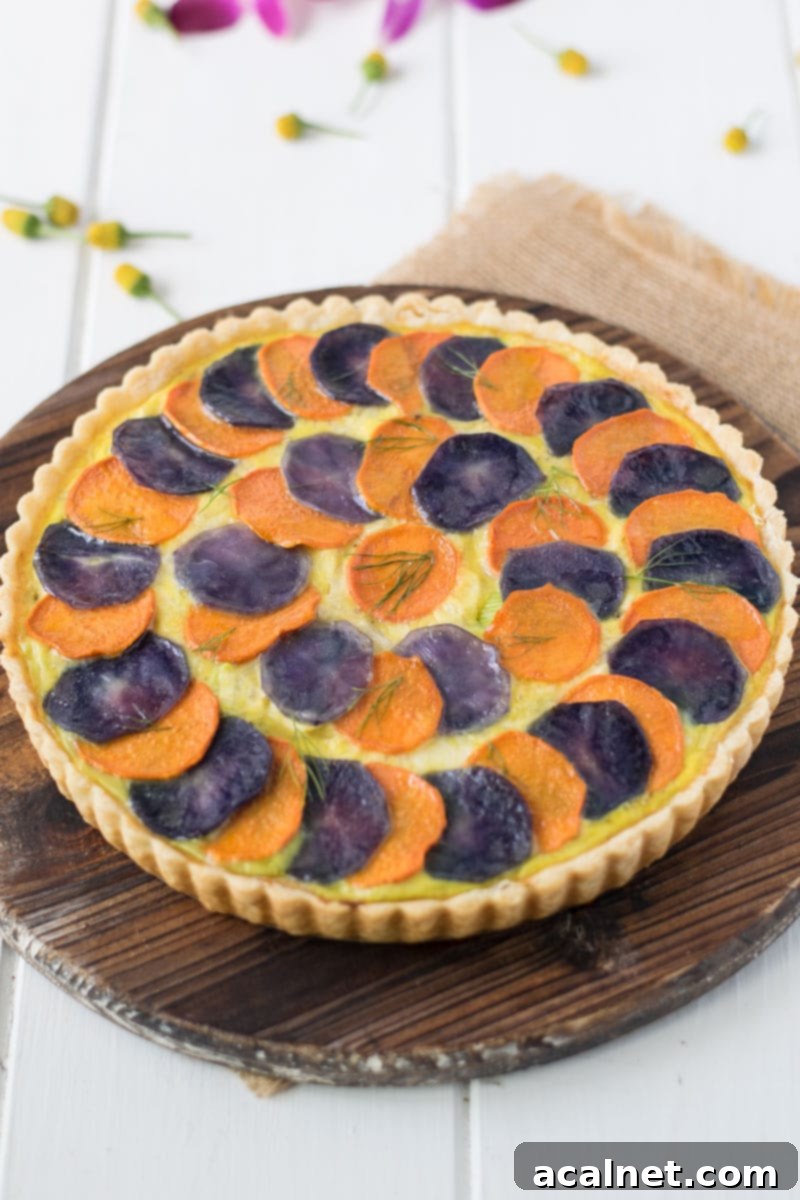 Potato and Vegetable Quiche, featuring sweet and purple potatoes layered with leeks, fennel, and a creamy egg mixture.
