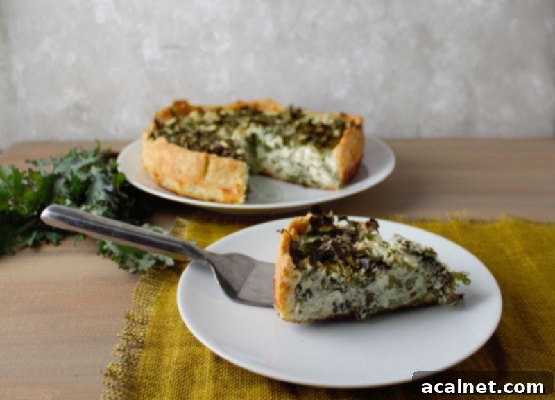 Kale and Goat Cheese Quiche, baked to golden perfection with visible kale leaves and creamy goat cheese.