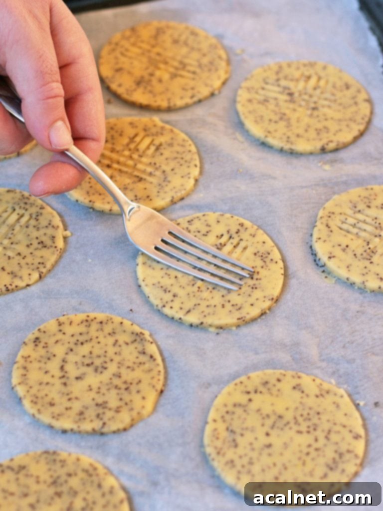 Pressing a fork on the shortbread to create the pattern