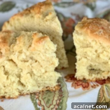 Irish soda bread cut into wedges on a napkin