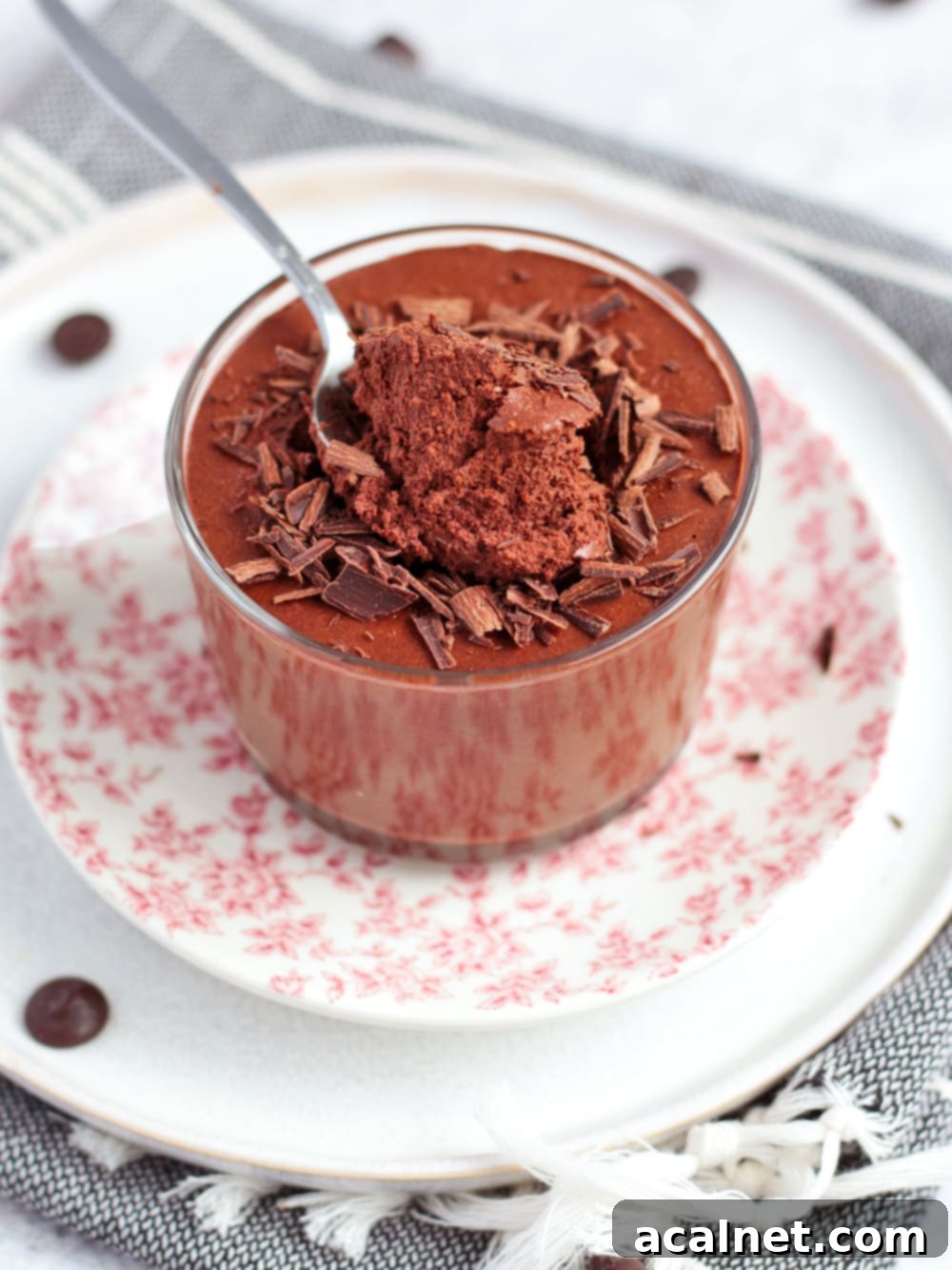 A spoon of Chocolate Mousse.