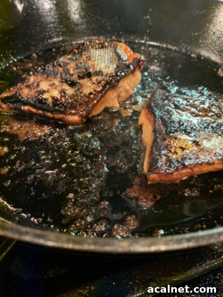 Sweet & Sticky Skillet Salmon 5 Salmon cooking.