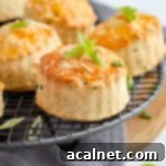 Close up on one scone topped with chopped spring onion
