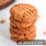 Stack of 4 cookies on a white surface