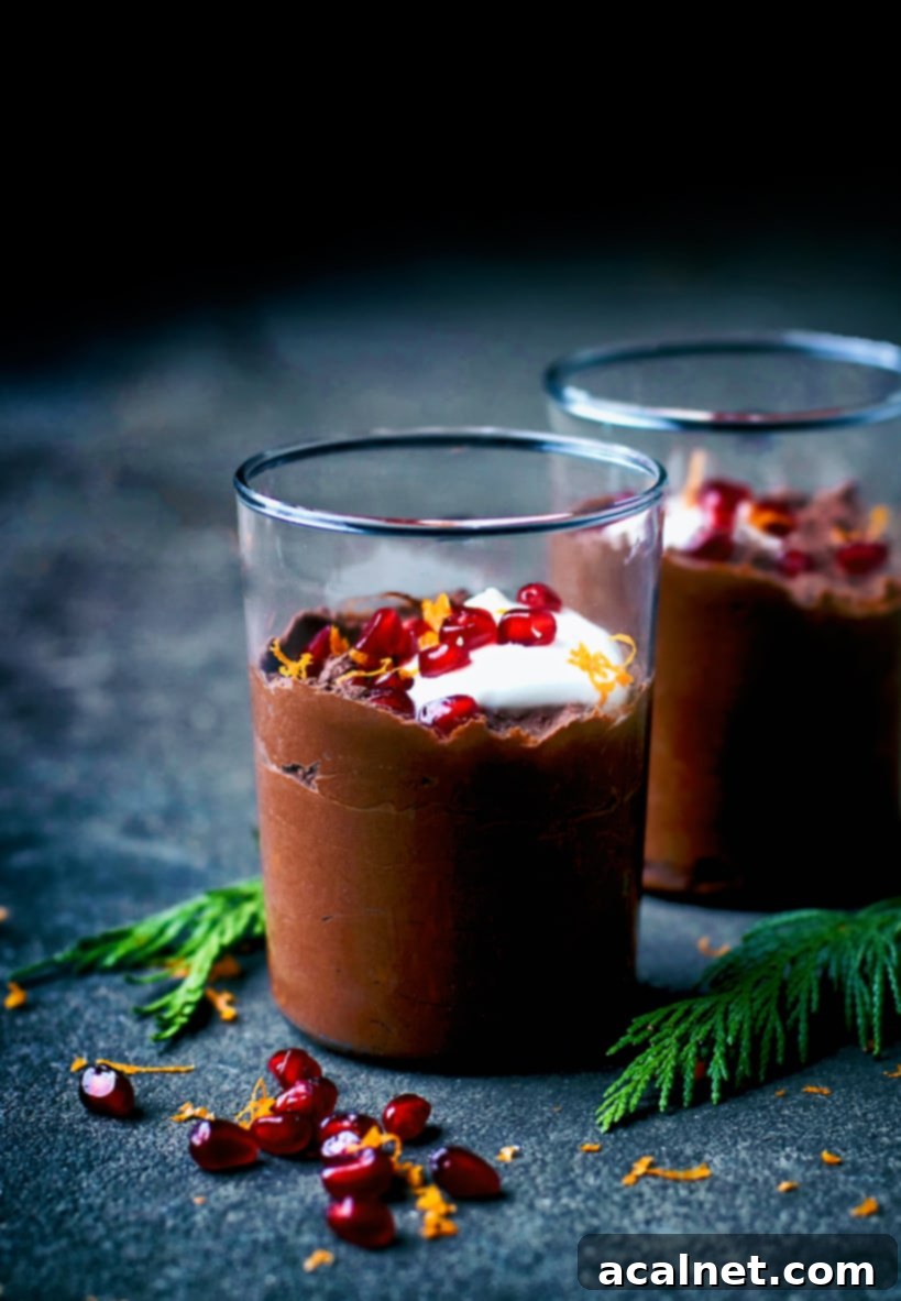 Individual Chocolate Orange Mousse cups, garnished and ready to serve.