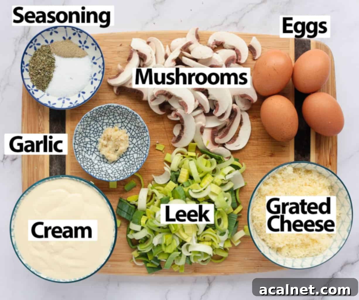 Ingredients for the quiche filling placed over a wooden cutting board, neatly arranged for preparation.