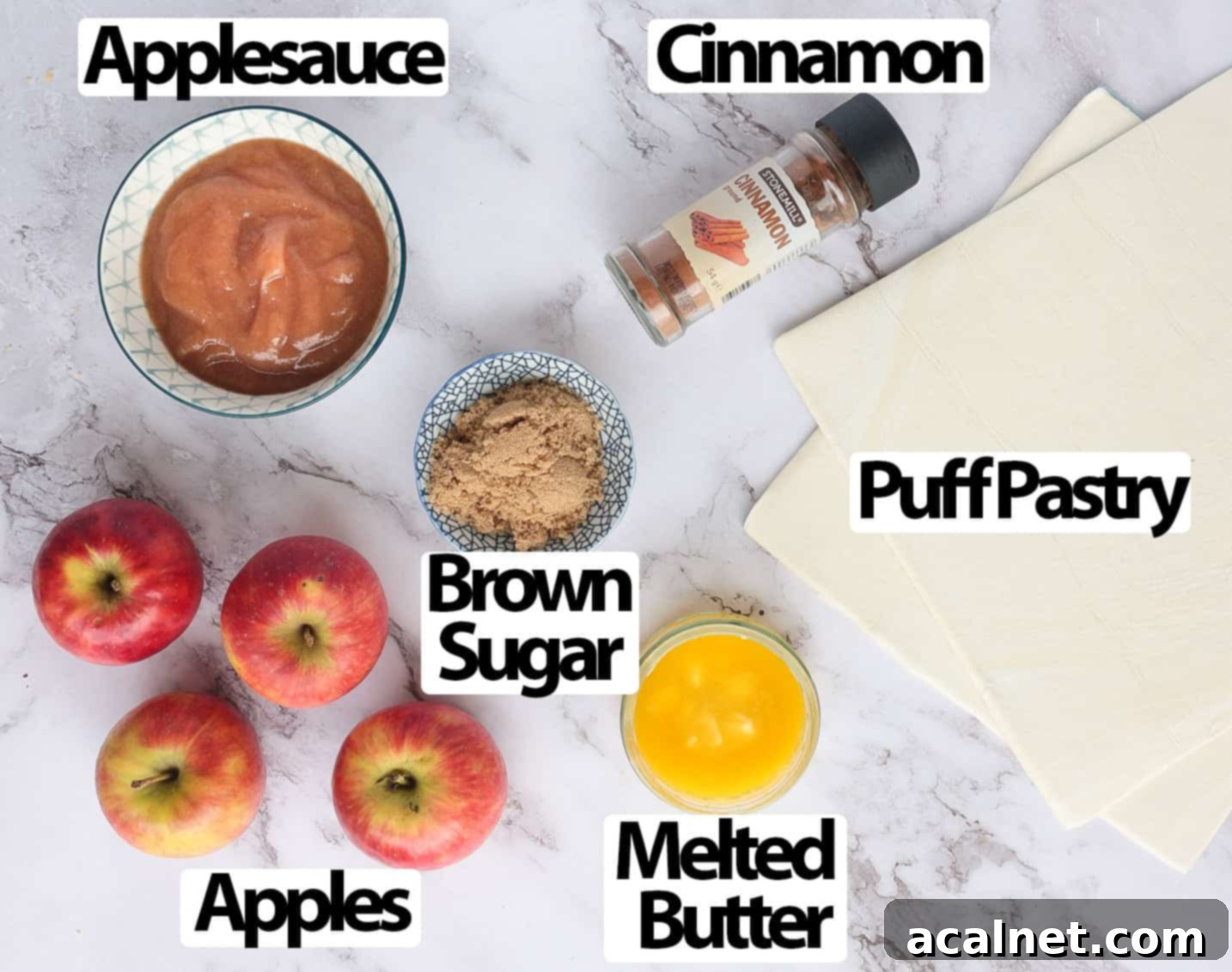 Flaky Apple Bites 3 Ingredients on a marble surface.