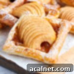 Flaky Apple Bites 9 Tartlet on a wooden cutting board