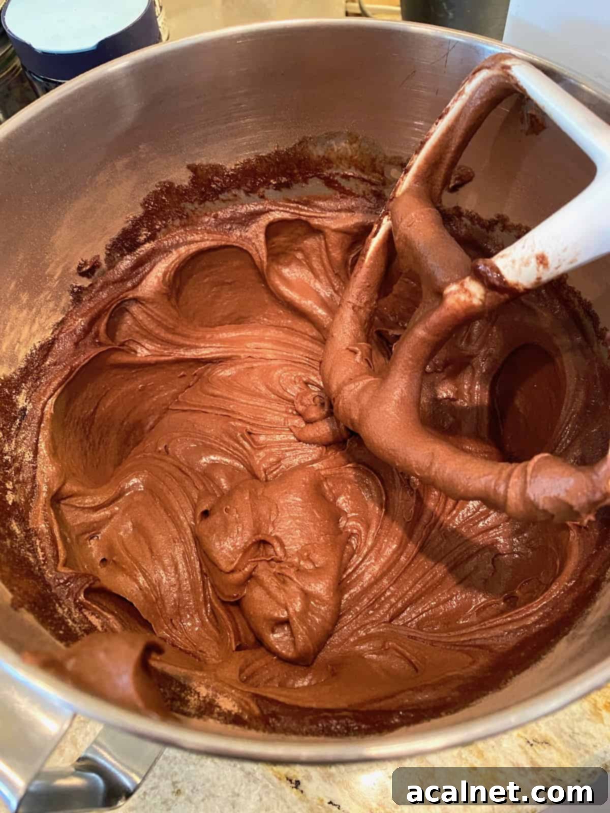 Brownie batter in a mixing bowl. 
