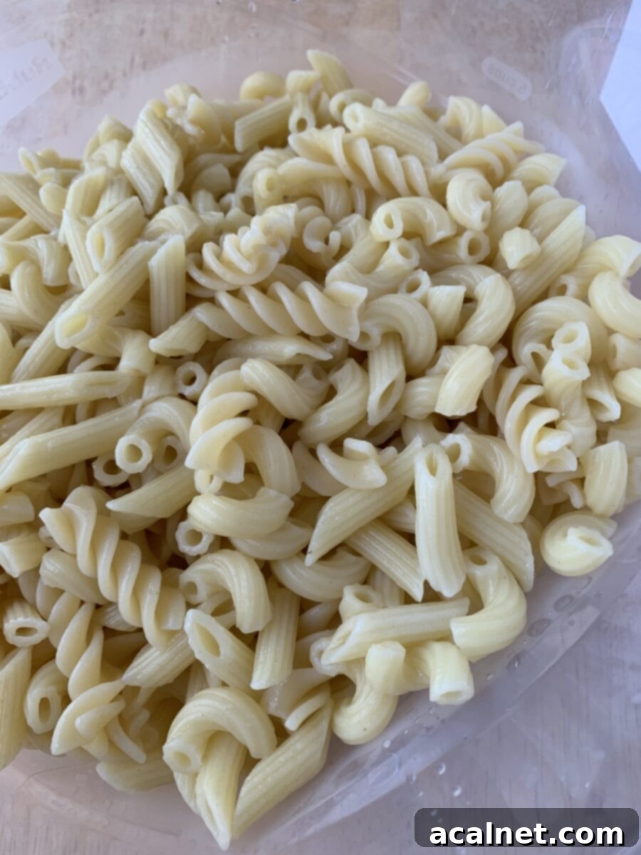 cooked pasta drained and ready for mixing