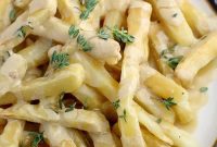 Loaded Vegan Poutine Recipe: Crispy Fries, Gravy & Cheese Curds