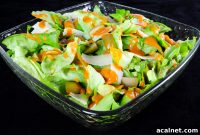 Butter Lettuce Salad with Cerignola Olives, Shaved Parmesan & Roasted Tomato Vinaigrette