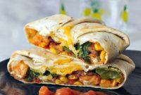 Crispy Fish Taco Crunchwrap with Fresh Mango Salsa