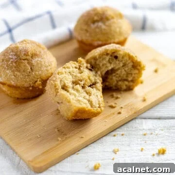 baked muffins on wooden cutting board