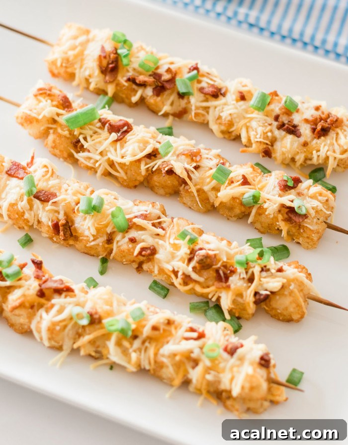 Finished tater tot skewers with green onions