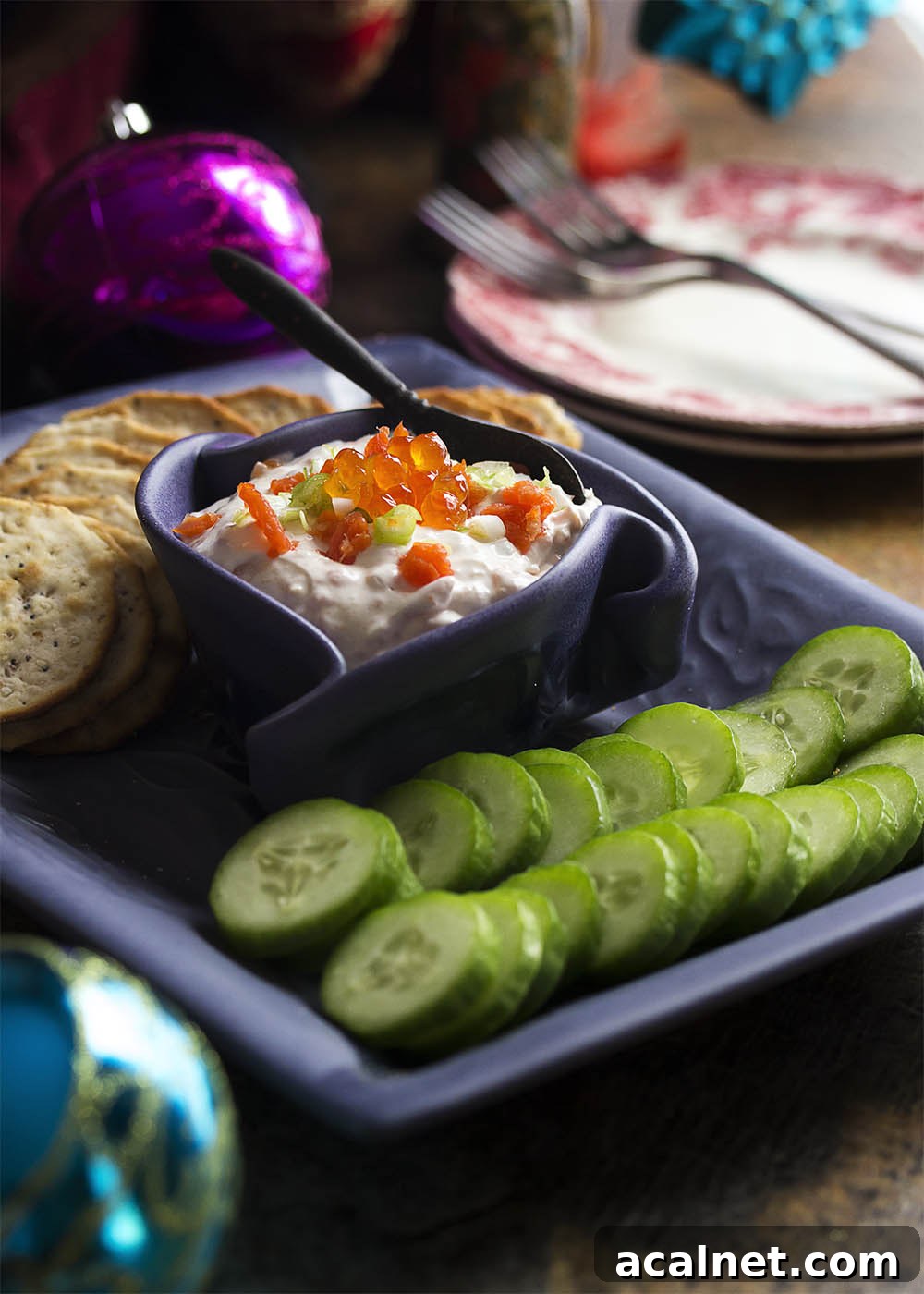 Smoked salmon cream cheese dip is a great and easy holiday party appetizer and it's even better with salmon caviar added to the mix!