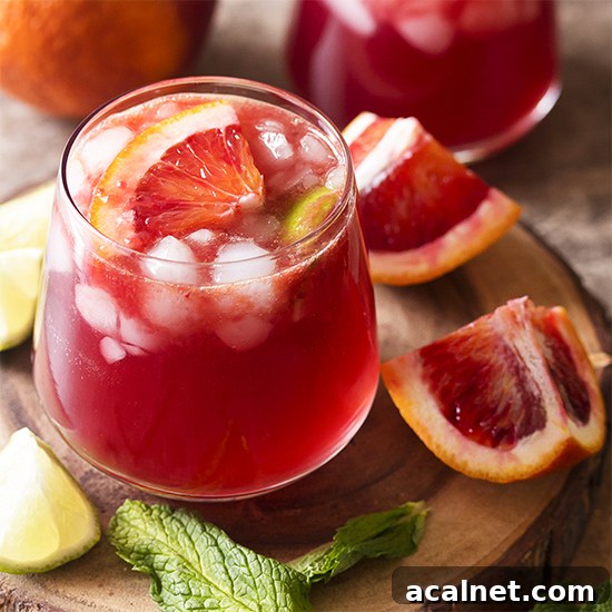 For a fun variation on the classic Moscow mule, try a blood orange Moscow mule! Ginger beer, lime, and vodka are mixed with blood orange juice and pomegranate in this tasty cocktail.