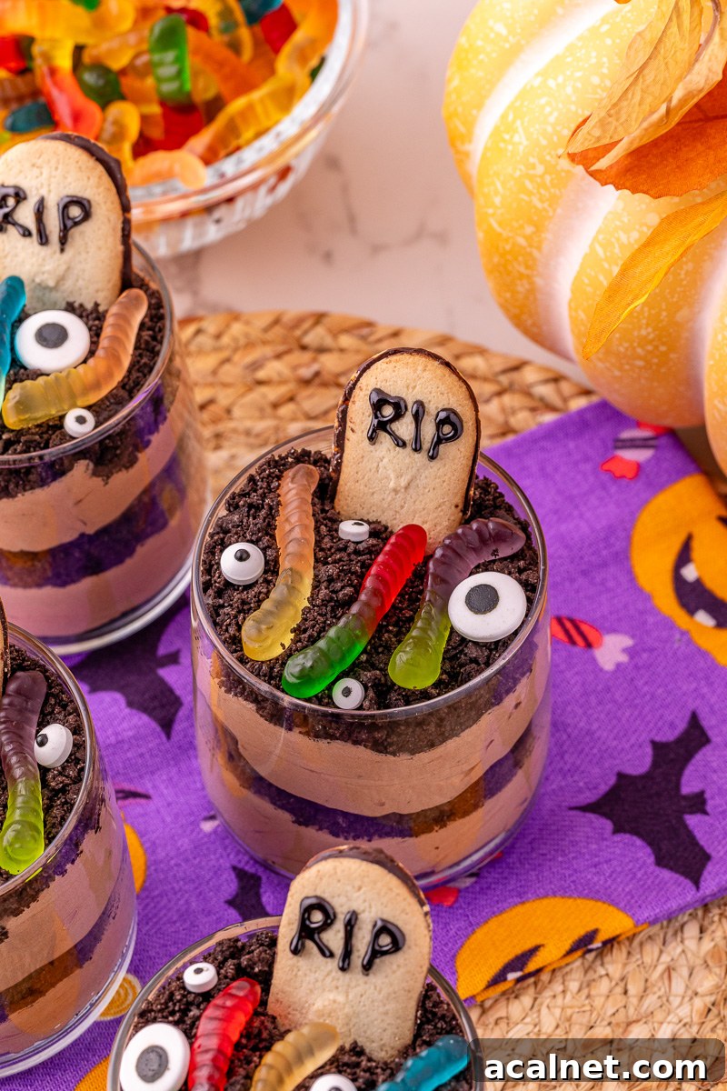 Side view of halloween dessert cup in small glasses.