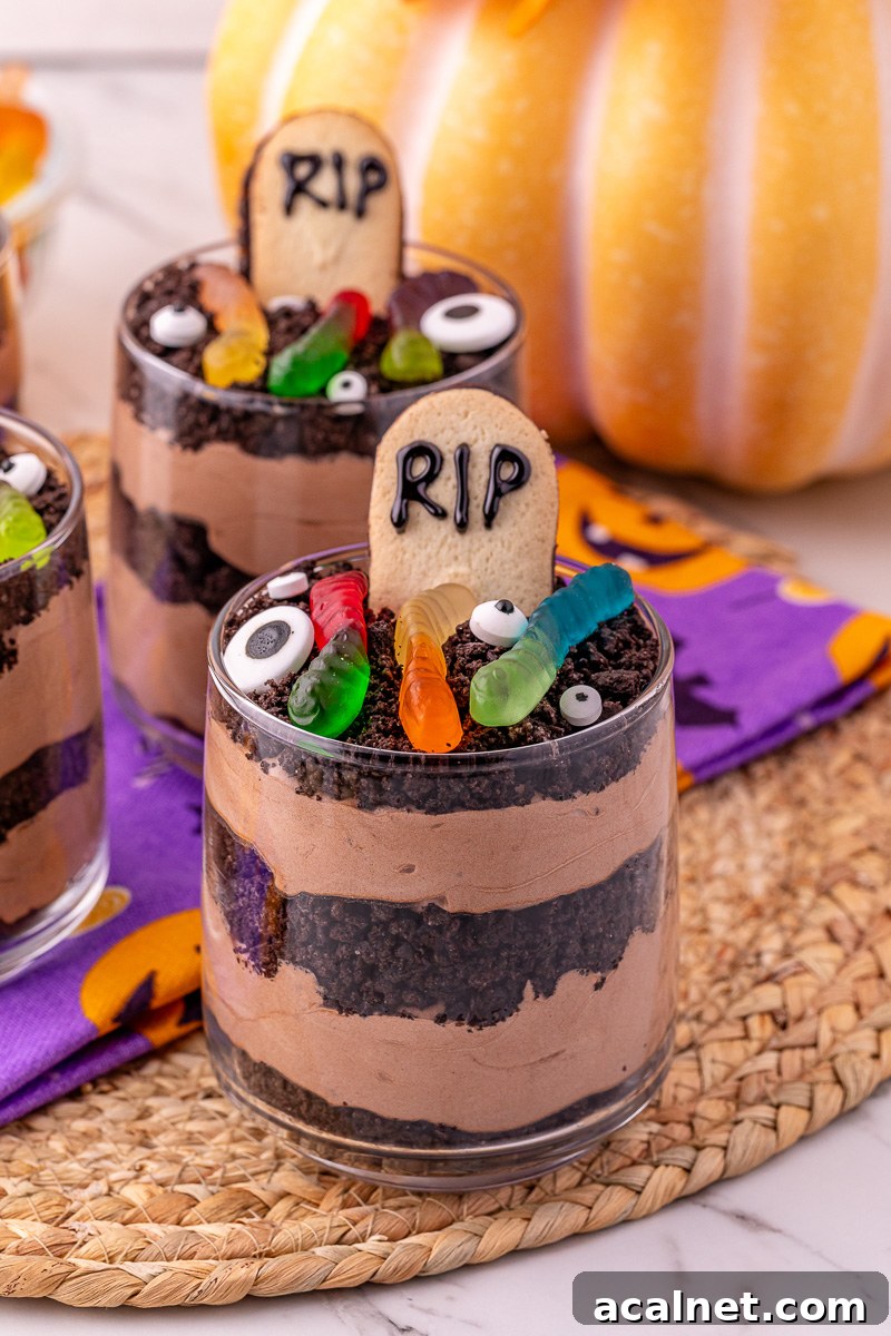 Halloween dessert cups in small glasses ready to serve.