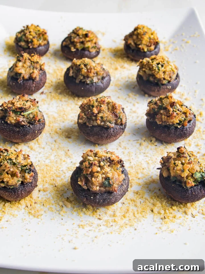 White rectangular serving plate with stuffed mushrooms