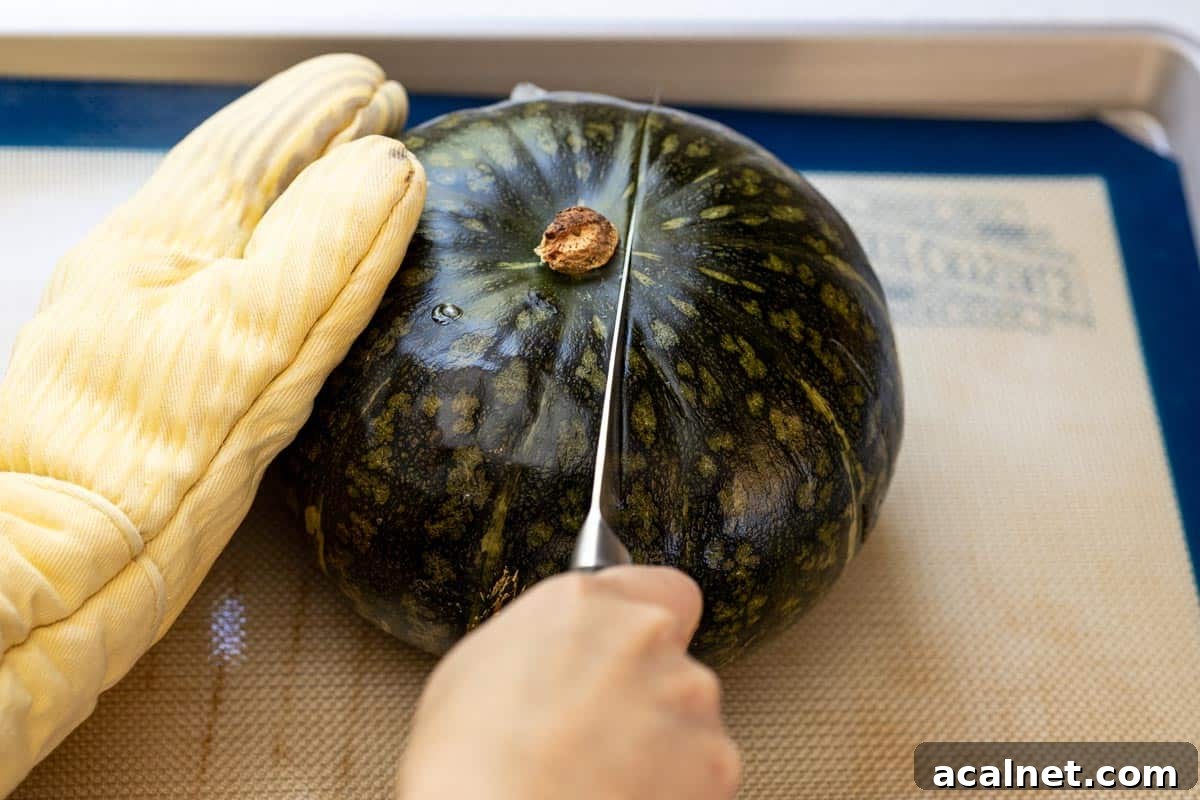 Cutting a roasted kabocha pumpkin.
