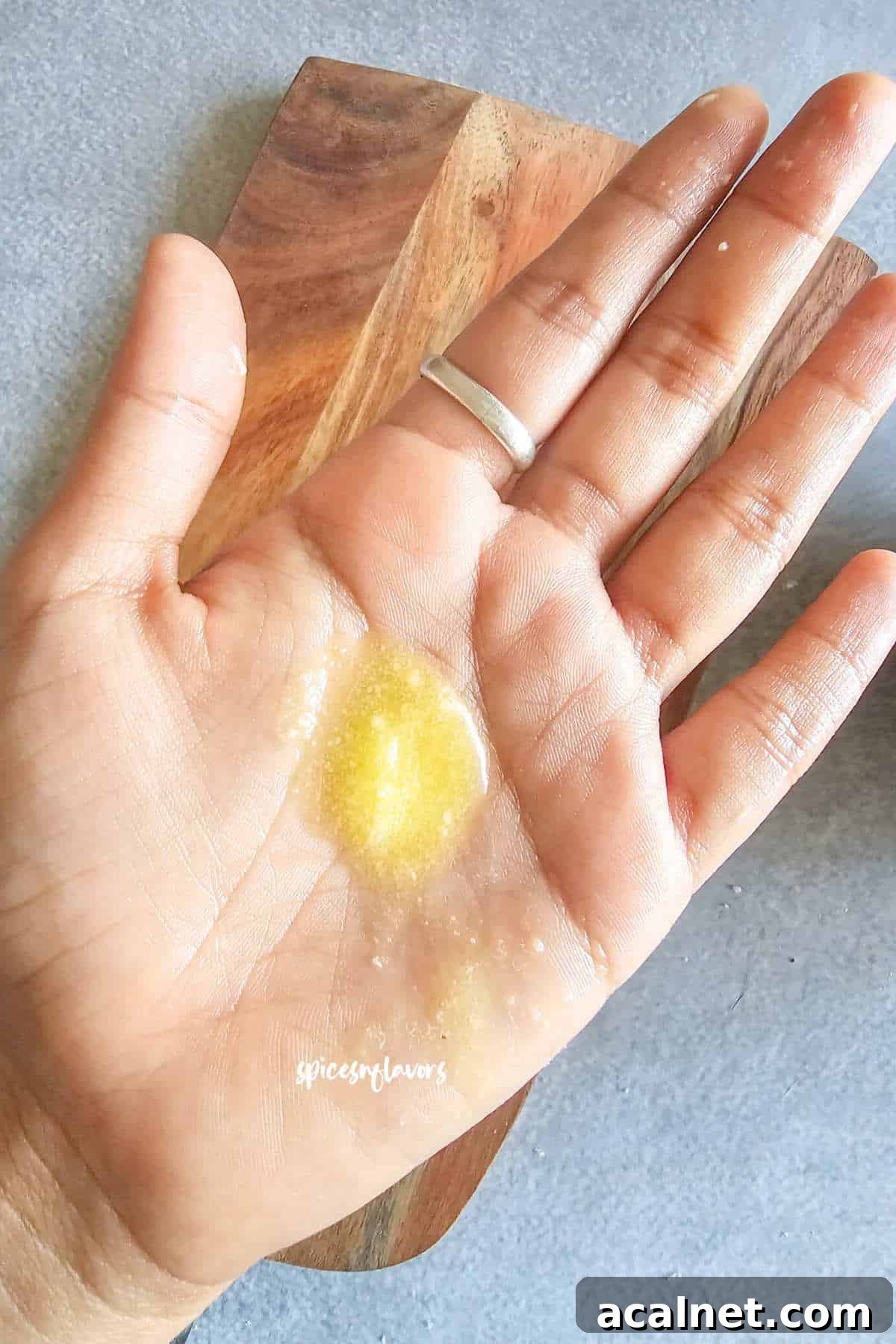 grease your hands with ghee