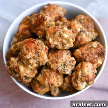 rotel cream cheese sausage balls in a bowl, next to a napkin.