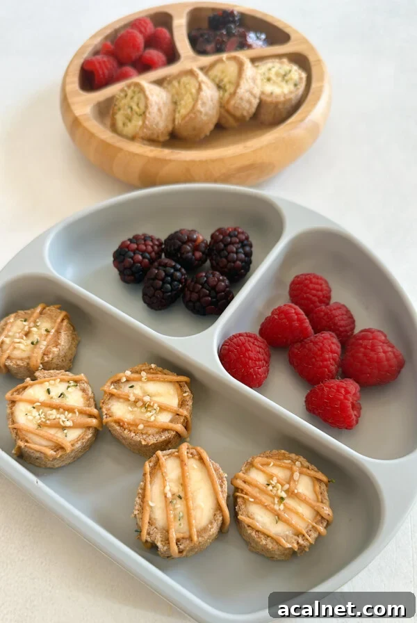 Banana sushi rolls served with berries.