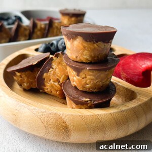 Peanut butter oatmeal cups served with berries.
